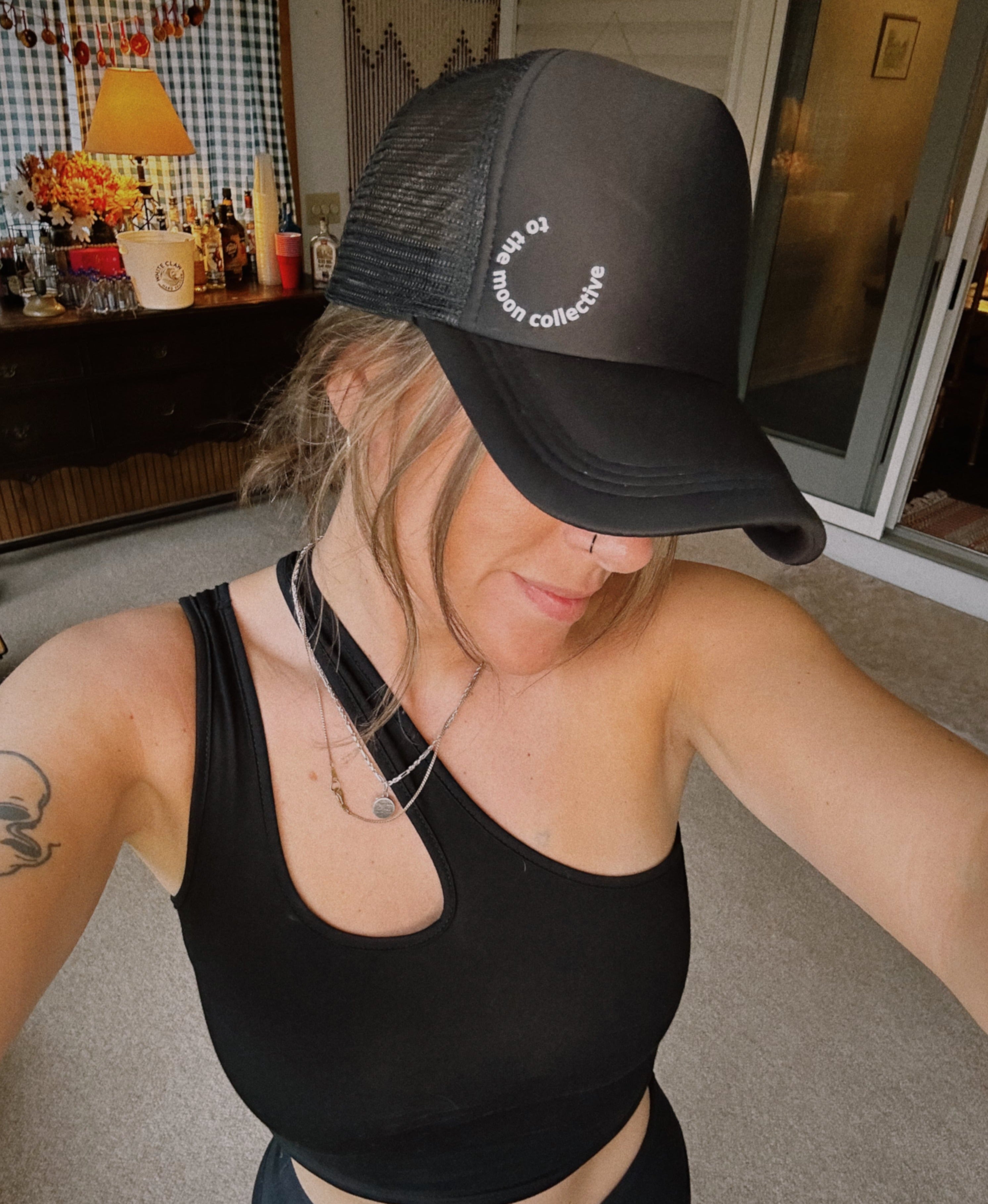 to the moon collective OG logo trucker