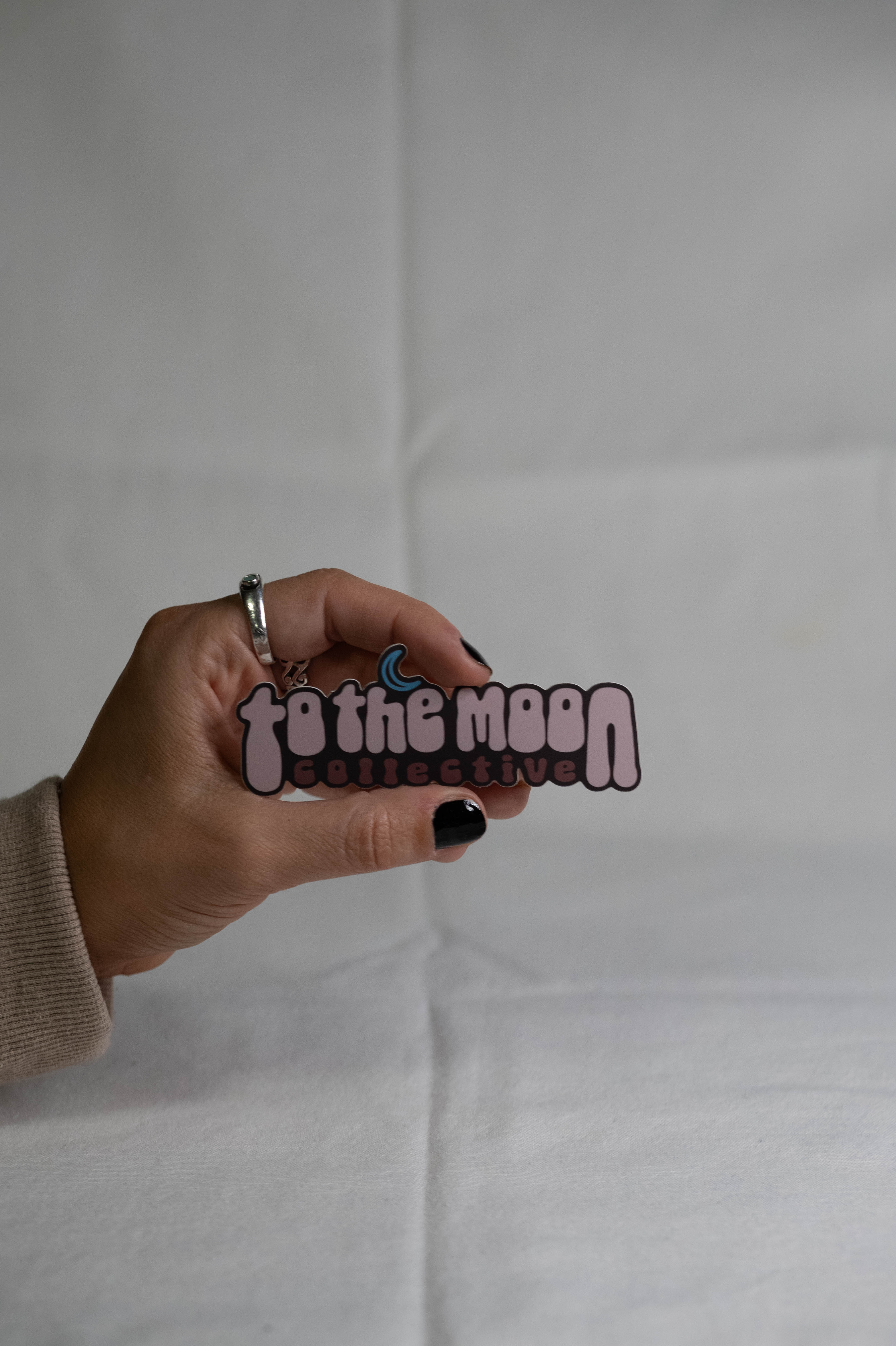 to the moon collective logo sticker